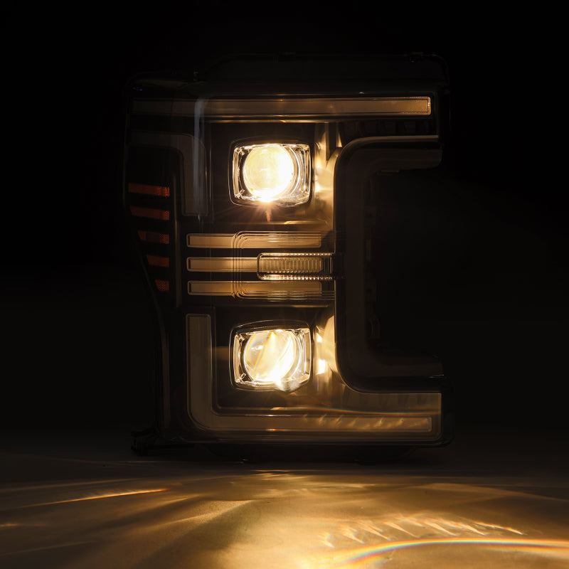 AlphaRex 17-19 Ford F-250/350/450/550 Super Duty PRO-Series Proj Headlights Black w/SeqSig & DRL
