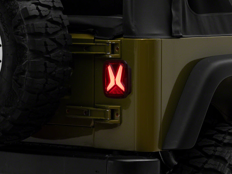 Raxiom 76-06 Jeep CJ7 Wrangler YJ & TJ Gladiator LED Tail Lights- Black Housing (Smoked Lens)