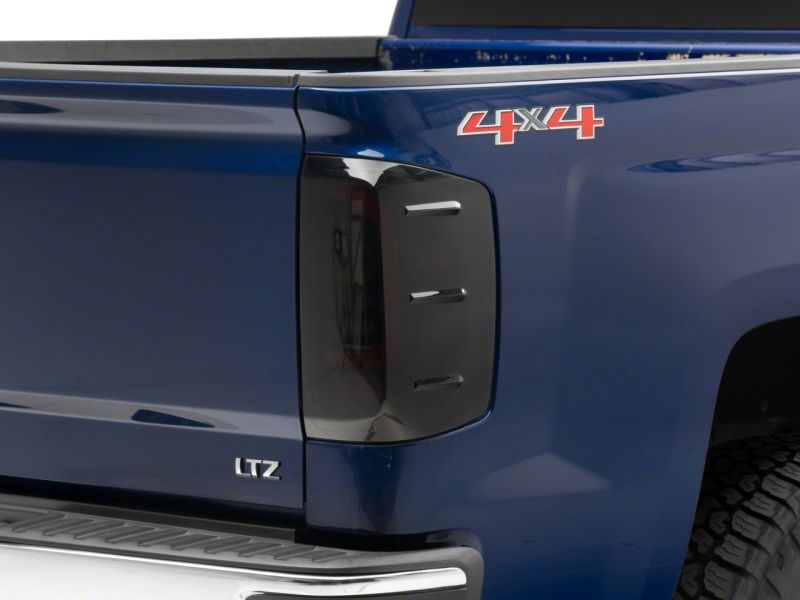 Raxiom 14-18 Chevrolet Silverado 1500 Axial Series LED Tail Lights- Black Housing (Smoked Lens)