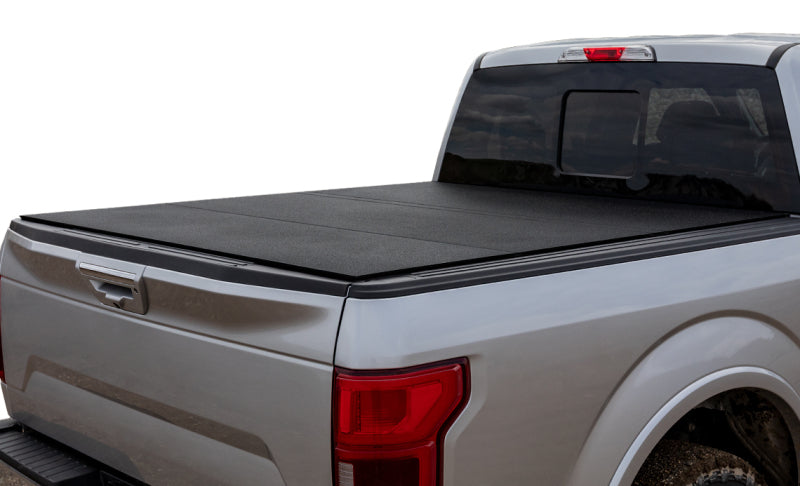 Access LOMAX 2022+ Rivian R1T 4ft 6in Bed (w/ OEM Tonneau Track) Folding Hard Cover - Black Urethane