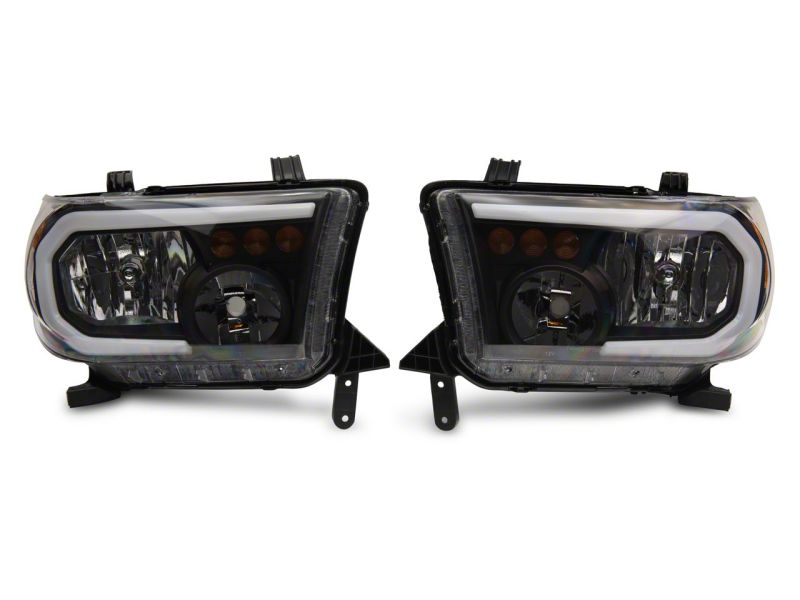 Raxiom 07-13 Toyota Tundra Axial Series Headlights w/ LED Bar- Black Housing (Clear Lens)