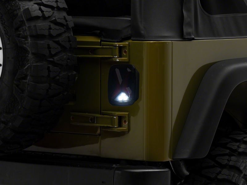 Raxiom 76-06 Jeep CJ7 Wrangler YJ & TJ Gladiator LED Tail Lights- Black Housing (Smoked Lens)