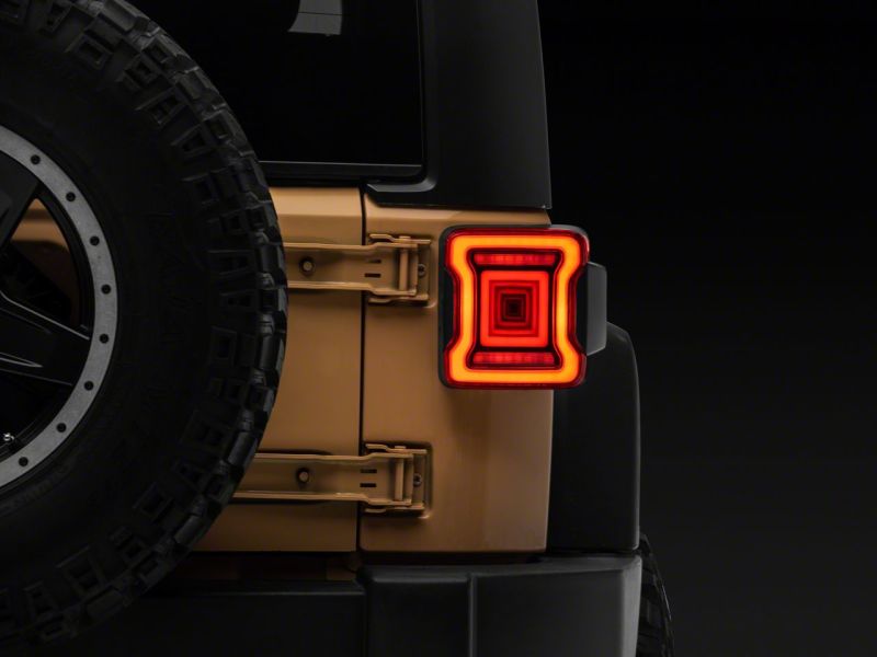 Raxiom 07-18 Jeep Wrangler JK Axial Series JL Style LED Tail Lights- Black Housing- Red Lens