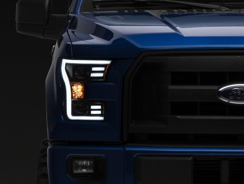 Raxiom 15-17 Ford F-150 G3 Projector Headlights w/ LED Accent- Black Housing (Clear Lens)