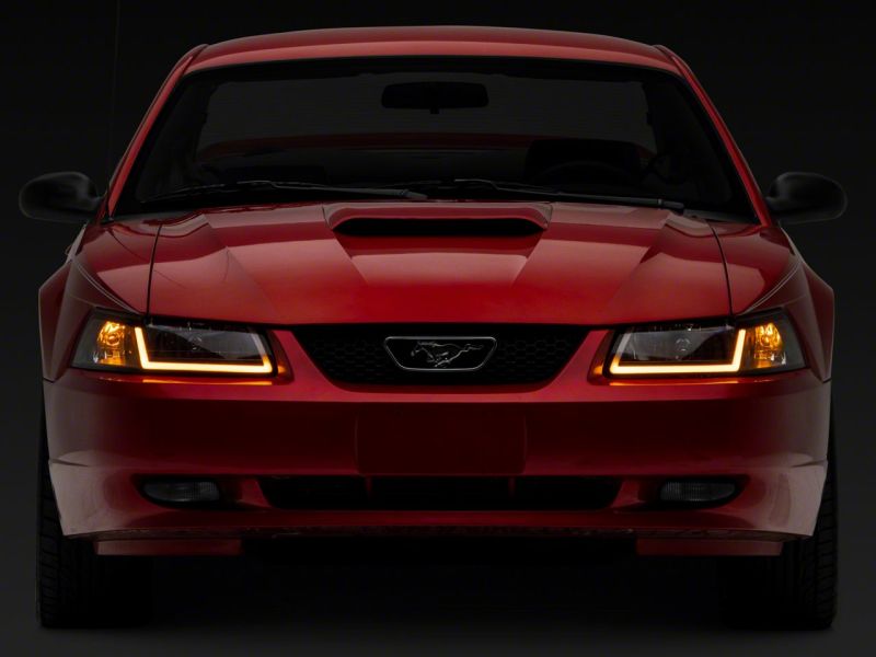 Raxiom 99-04 Ford Mustang Axial Series Headlights w/ Sequential LED Bar- Black Housing (Clear Lens)