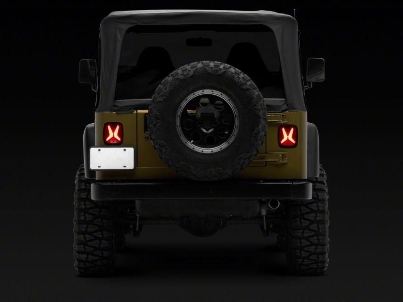 Raxiom 76-06 Jeep CJ7 Wrangler YJ & TJ Gladiator LED Tail Lights- Black Housing (Smoked Lens)